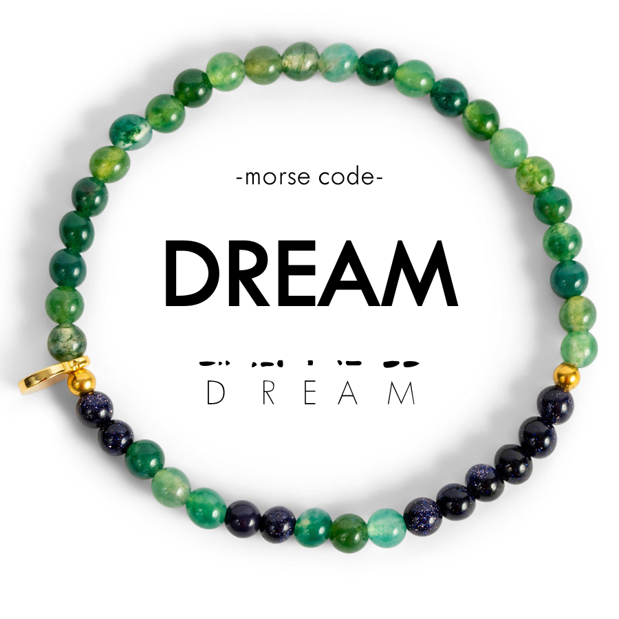 Beaded bracelet with 'DREAM' text on a white background