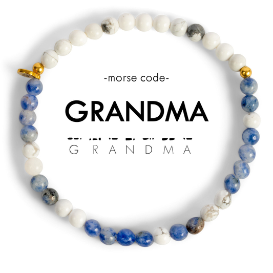 Beaded bracelet with 'GRANDMA' in Morse code on a white background