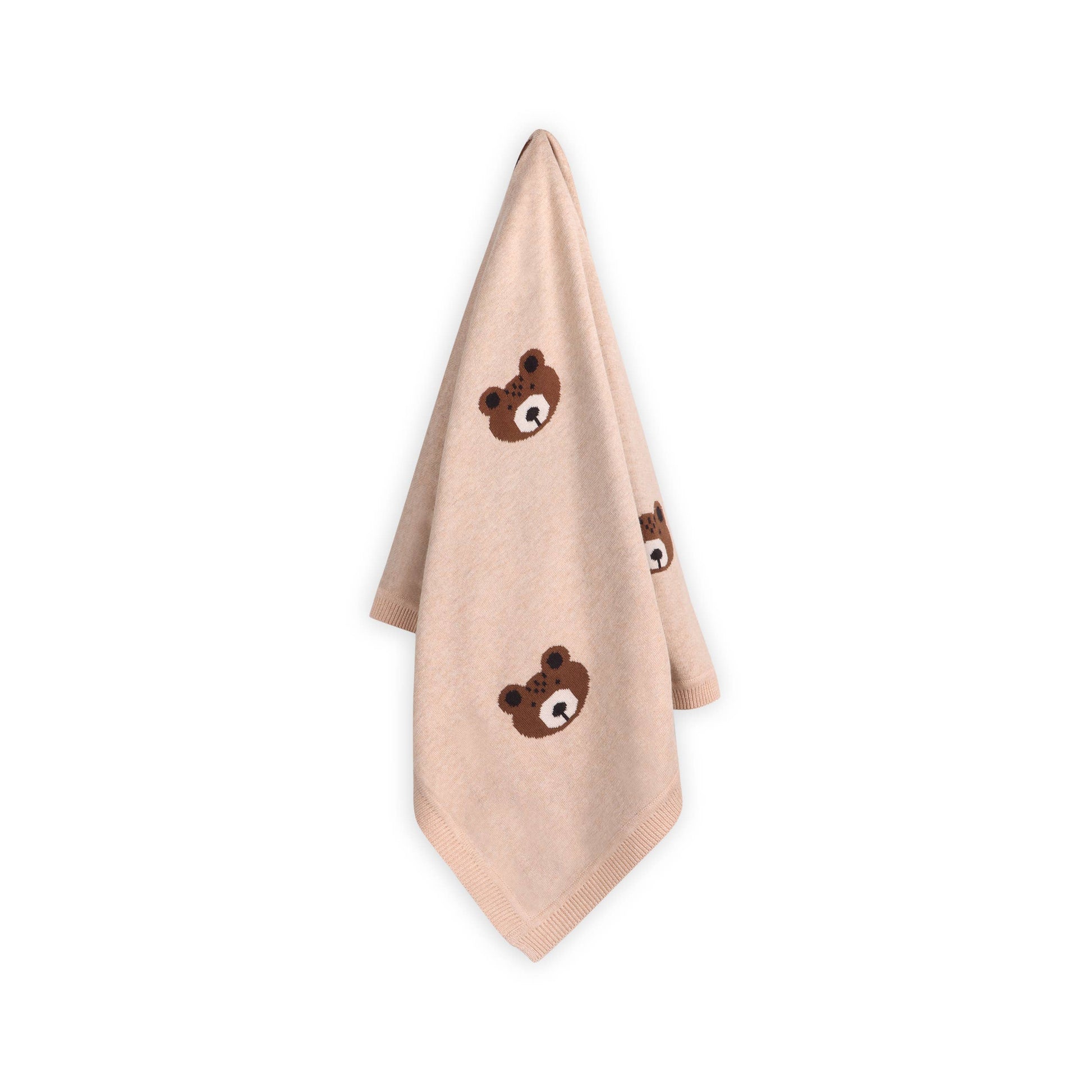Beige blanket with brown bear faces on a white background