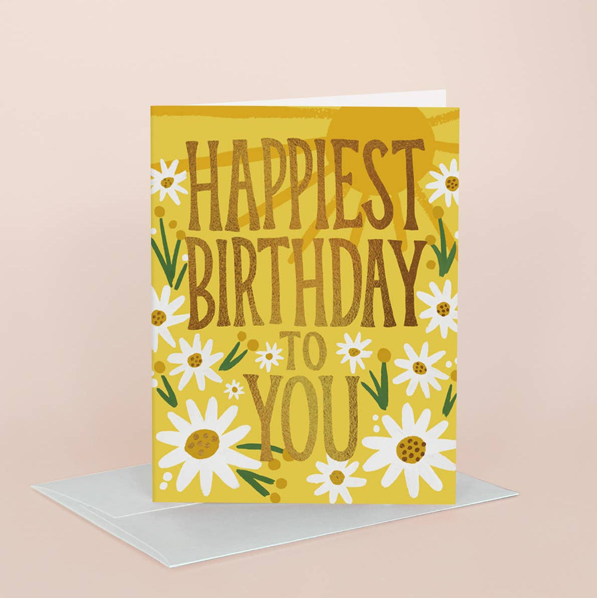 Birthday card with 'Happiest Birthday to You' text and daisy flowers on a yellow background
