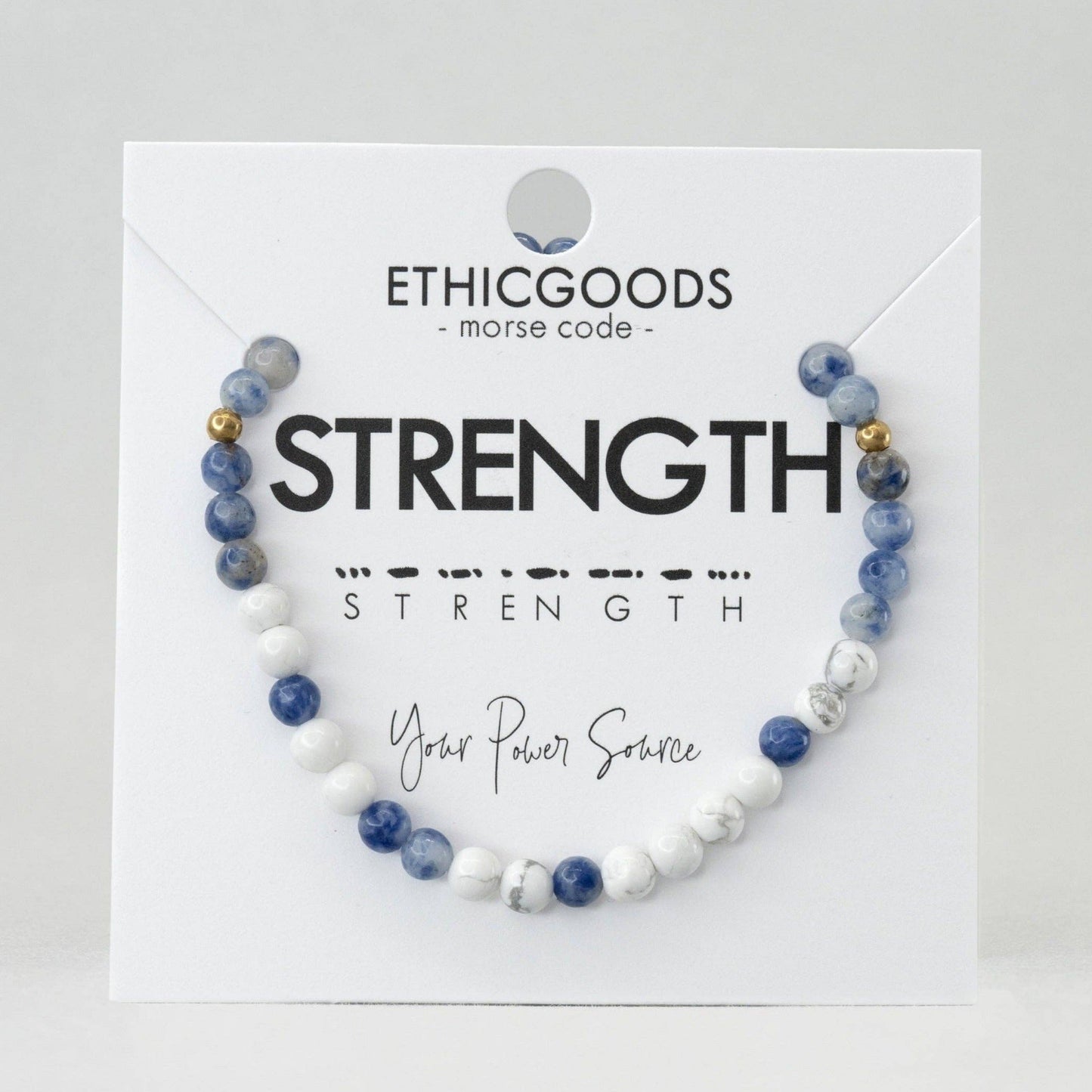 Bracelet with beads on a 'Strength' card by Ethicgoods