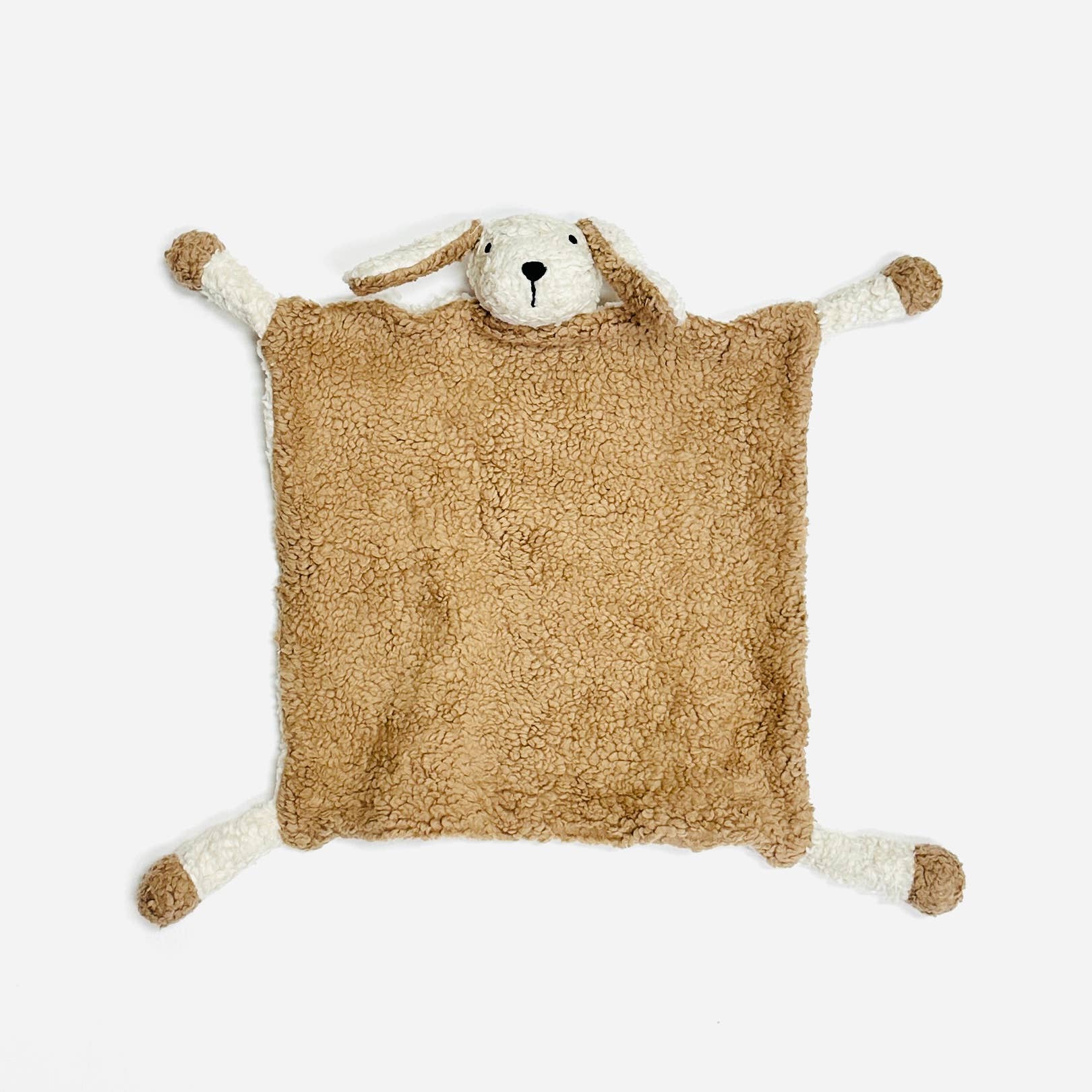 Brown plush toy with a face on a white background