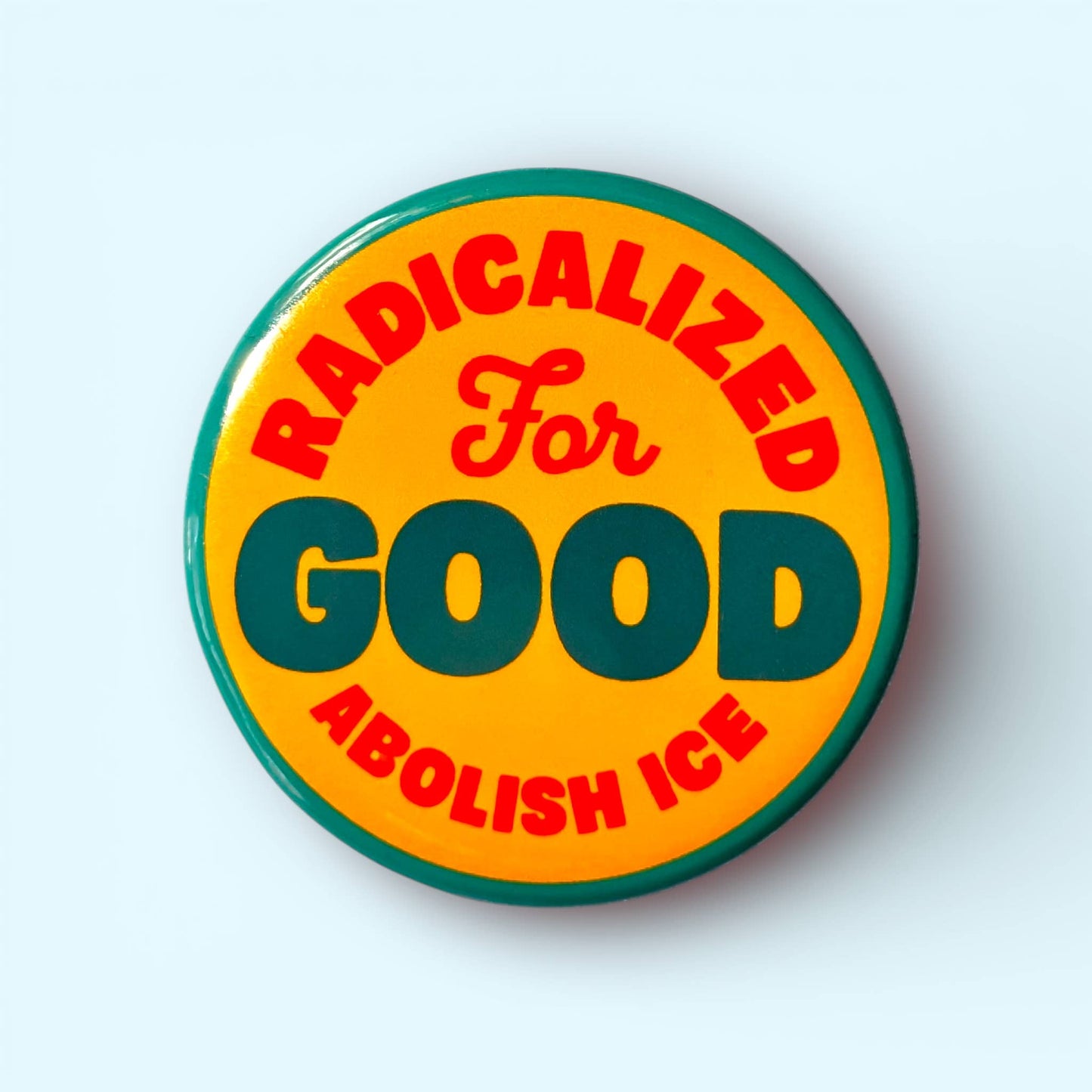 Button badge with text 'RADICALIZED FOR GOOD ABOLISH ICE' on a white background