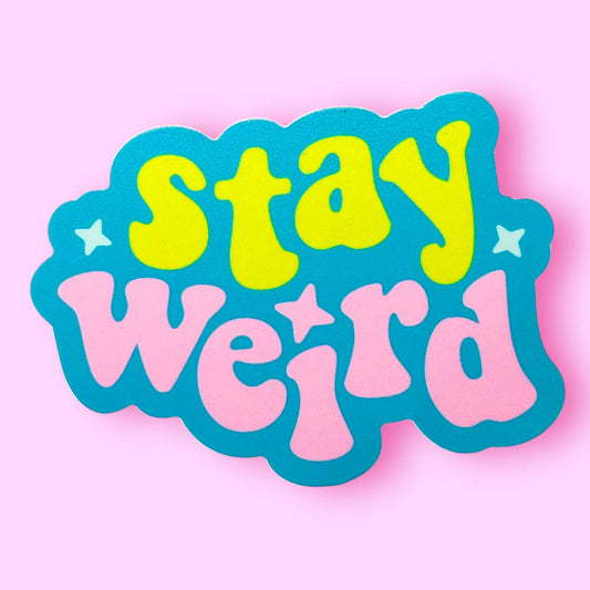 Colorful 'stay weird' text on a pink background
