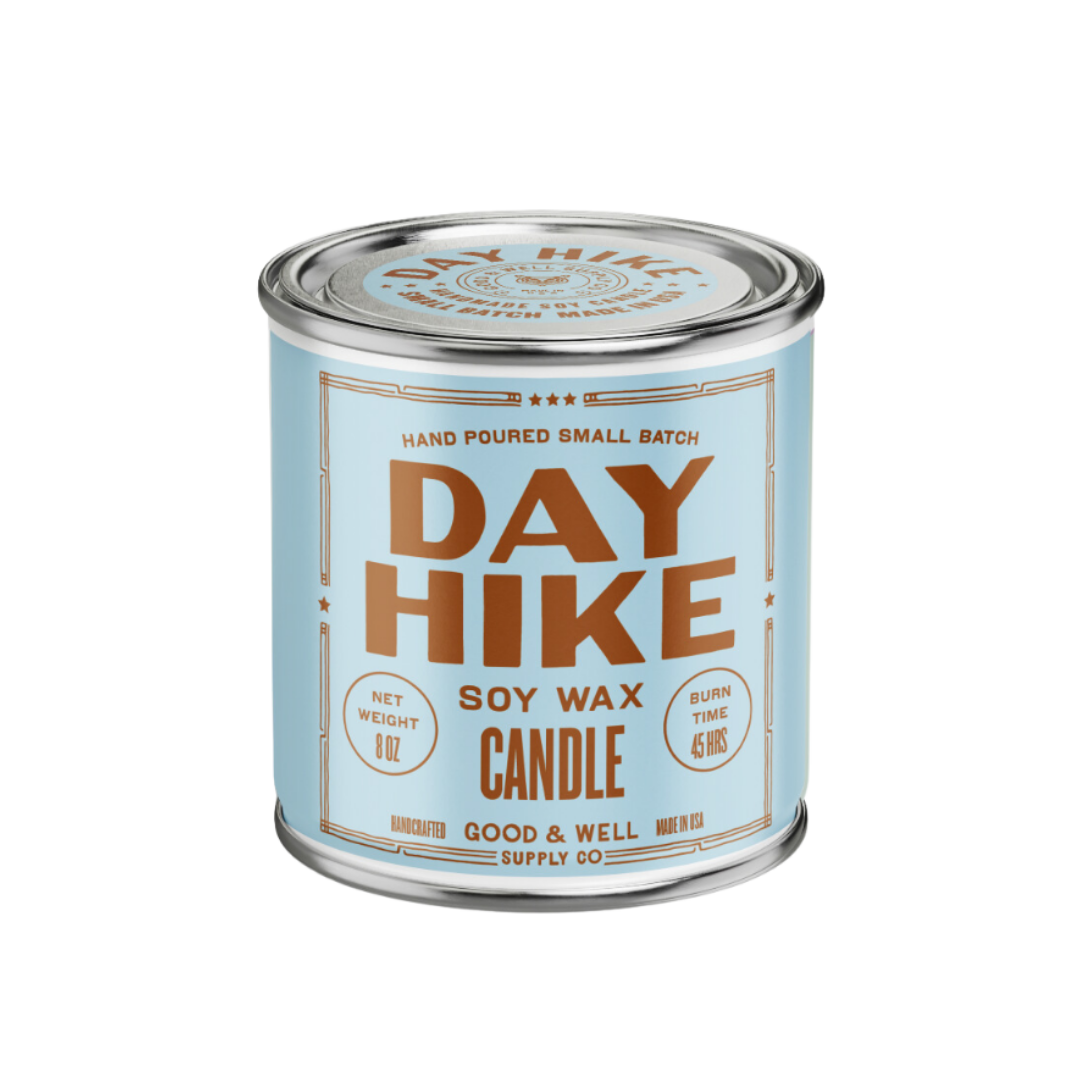 Day Hike soy wax candle in a tin can on a white background