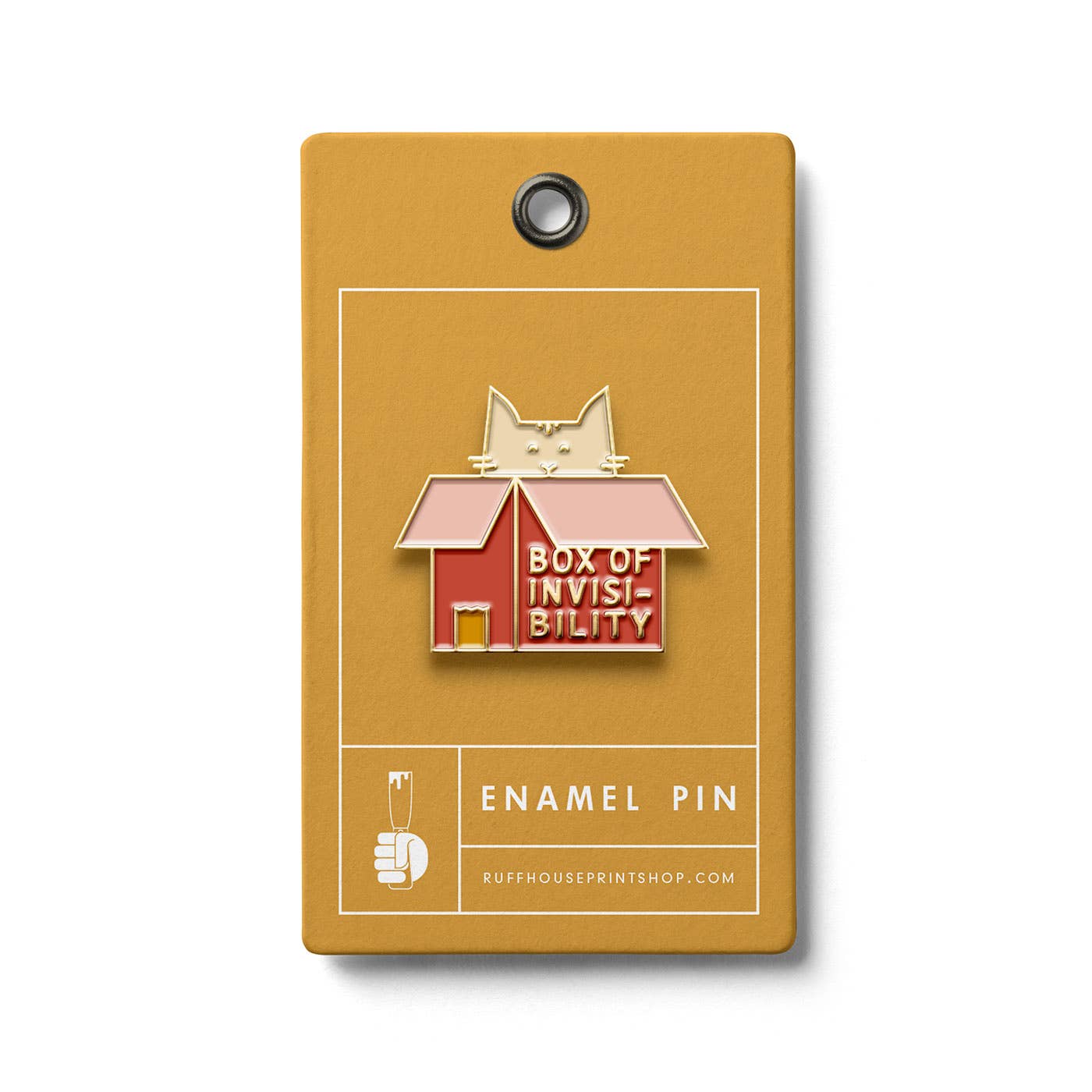 Enamel pin of a cat inside a box labeled 'Box of Invisibility' on a mustard yellow card.