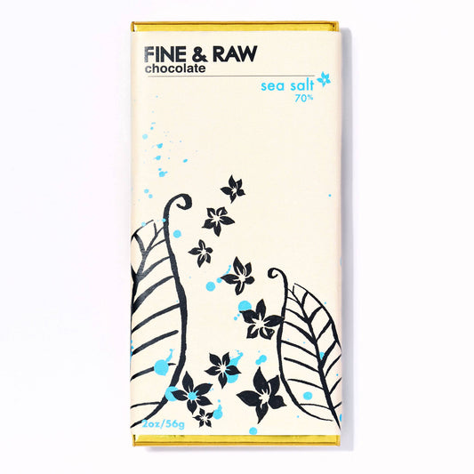 Fine & Raw chocolate bar packaging with floral designs on a white background