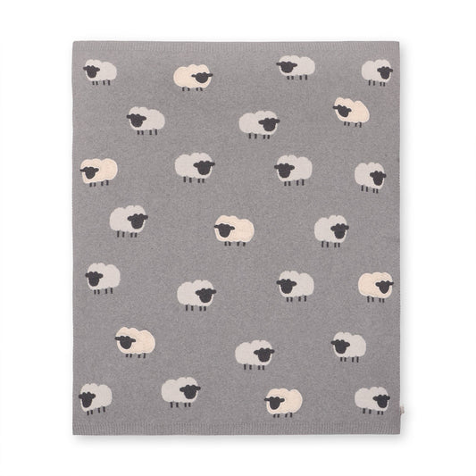 Gray blanket with white sheep pattern on a white background