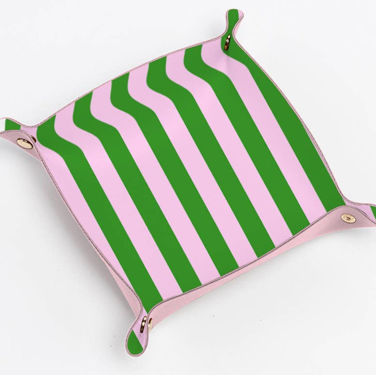 Green and pink striped pouch on a white background