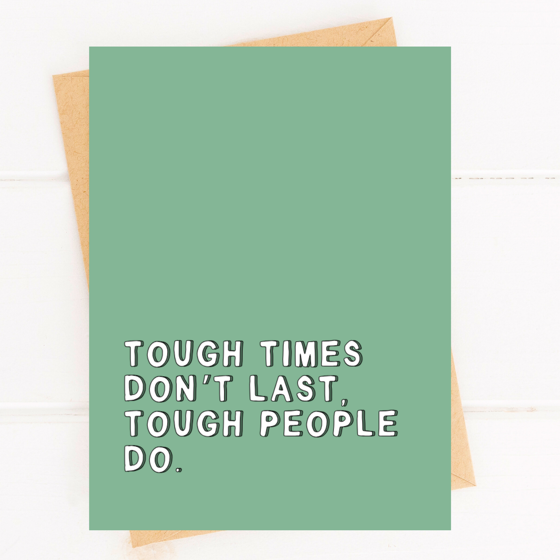 Green card with motivational quote on a white background