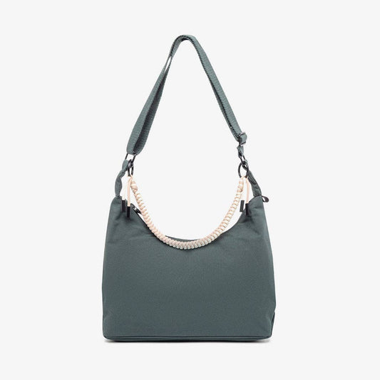 Green handbag with a braided handle on a white background