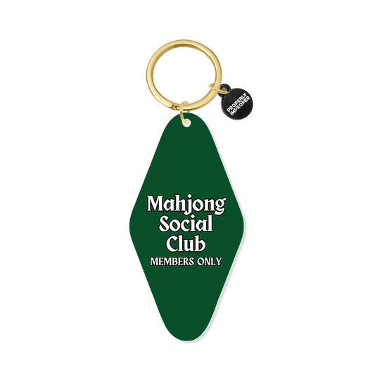Green keychain with 'Mahjong Social Club Members Only' text on a white background
