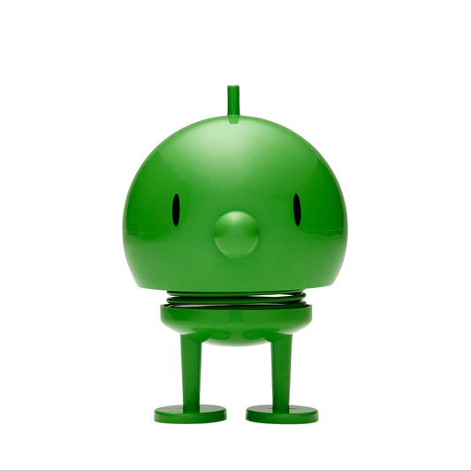Green robot toy on a white background