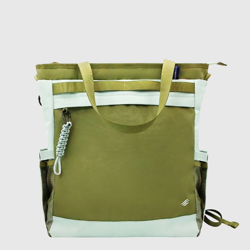 Green tote bag with white accents on a light gray background