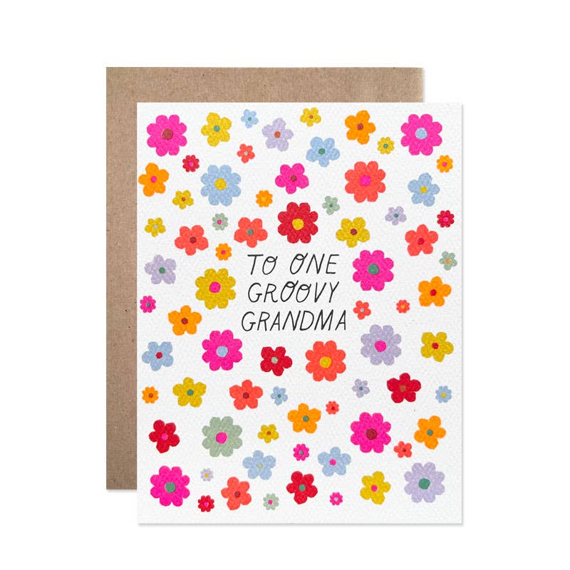 Greeting card with colorful flowers and 'To One Groovy Grandma' text on a white background.