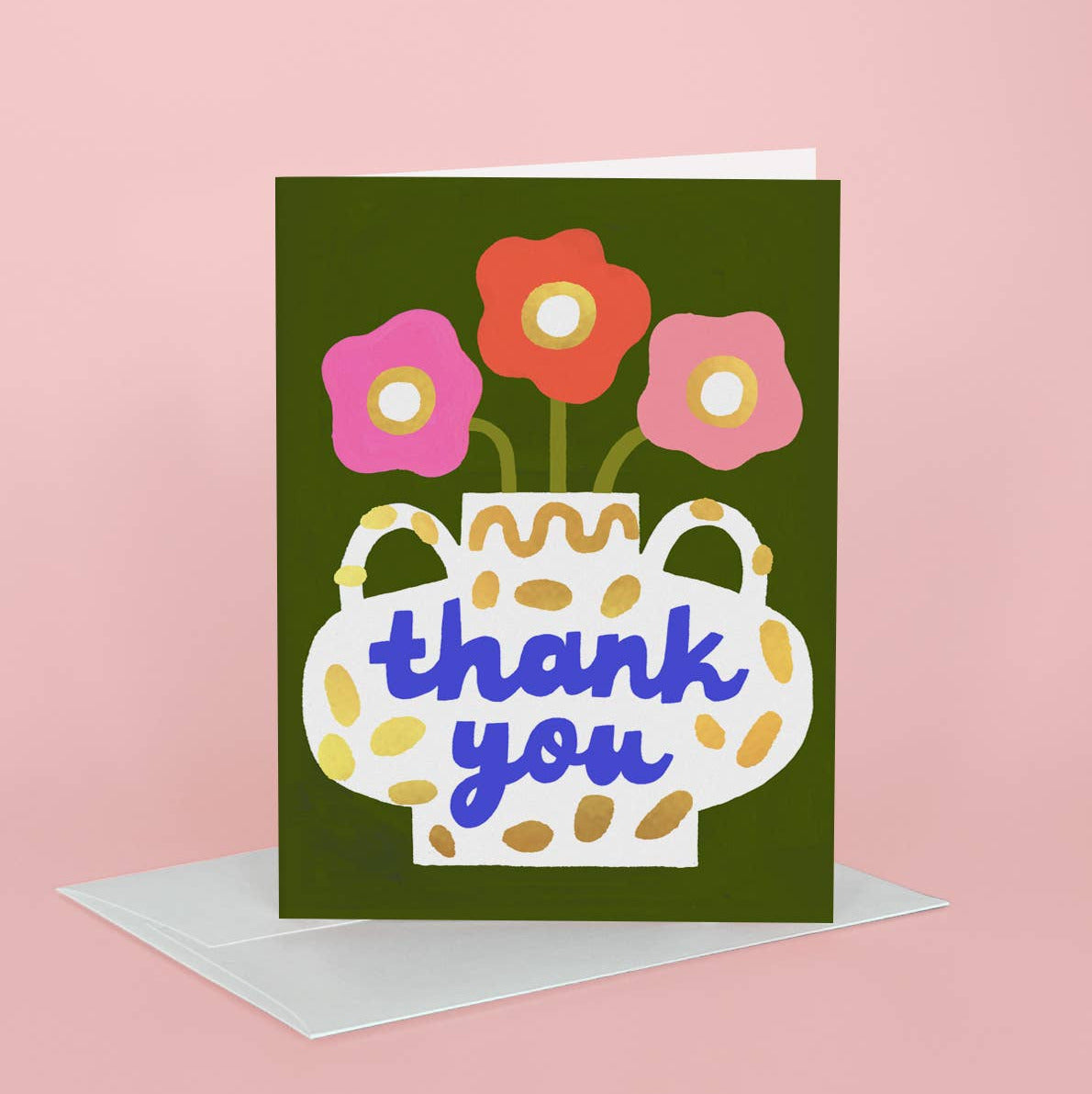 Greeting card with flowers and 'thank you' text on a pink background