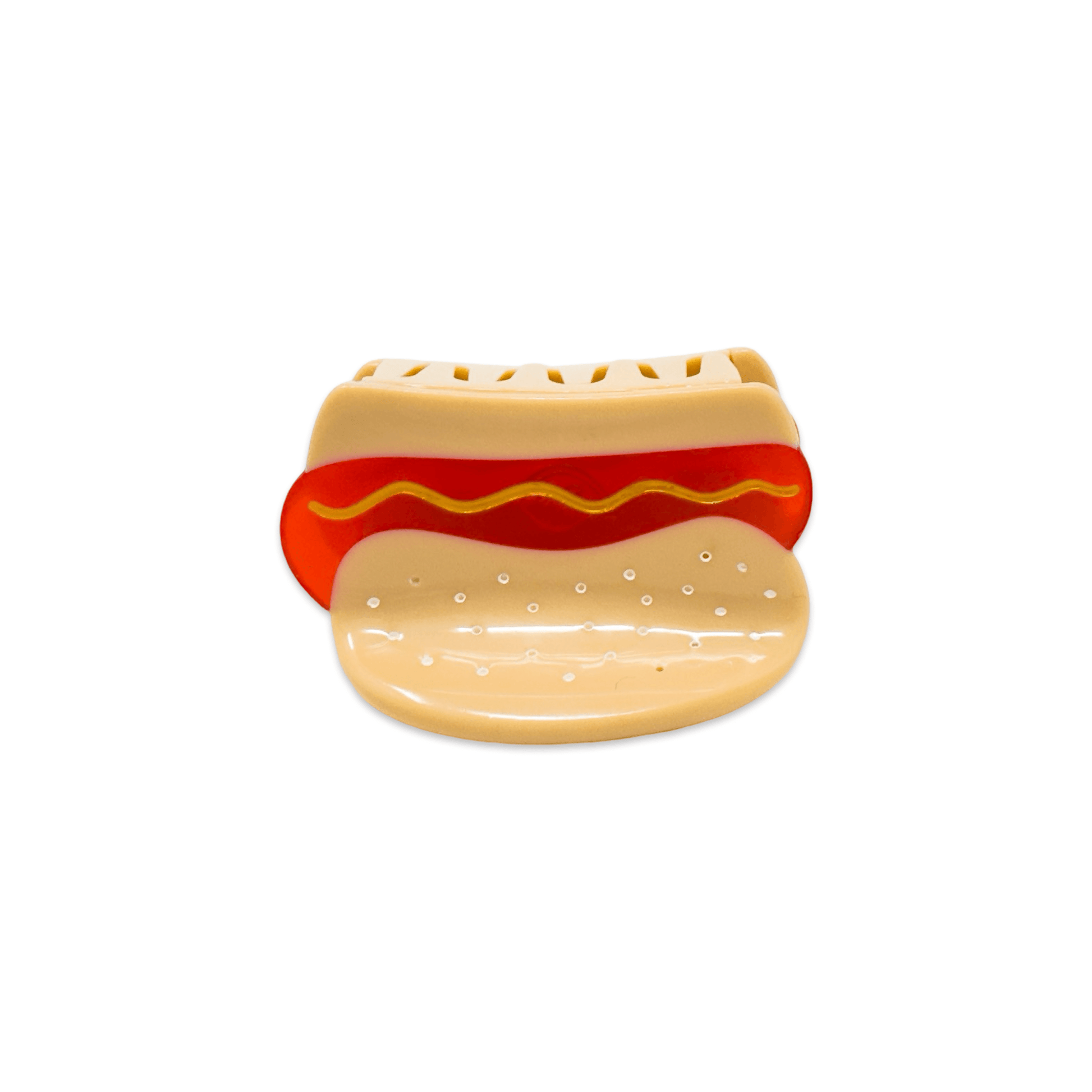 Hot dog-shaped cookie cutter on a white background