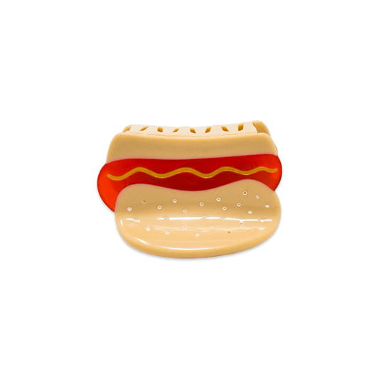 Hot dog-shaped cookie cutter on a white background