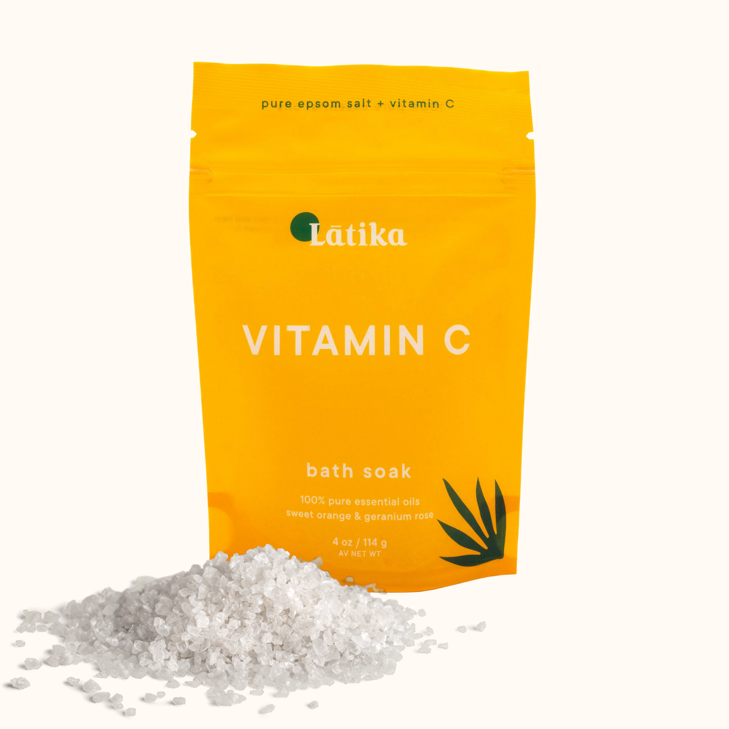 Yellow package of Latika Vitamin C bath soak with a pile of white powder on a white background