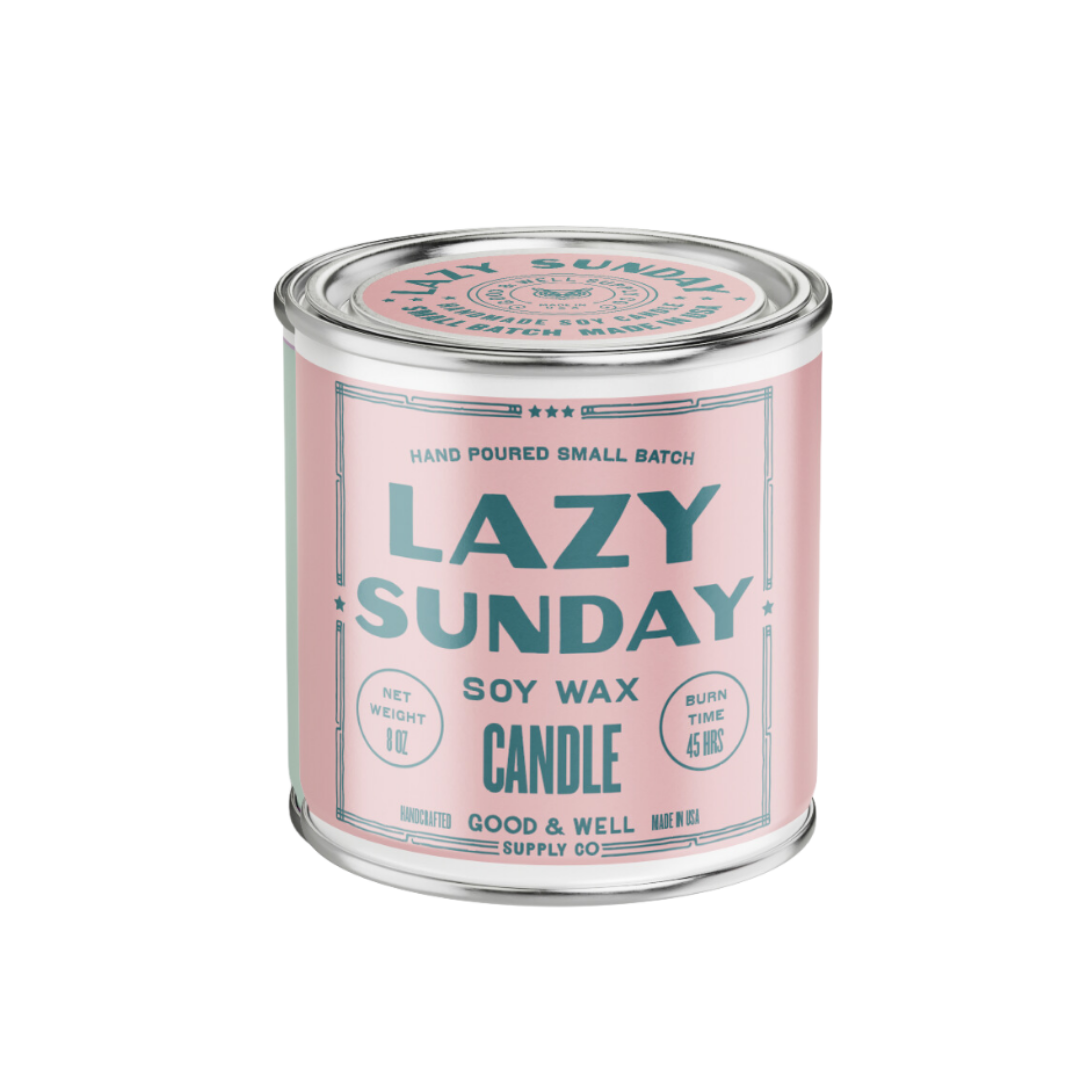 Candle jar labeled 'Lazy Sunday' with a pink label on a white background
