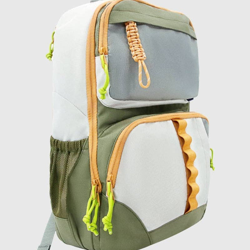 Multicolored backpack with green, white, and orange accents on a light gray background