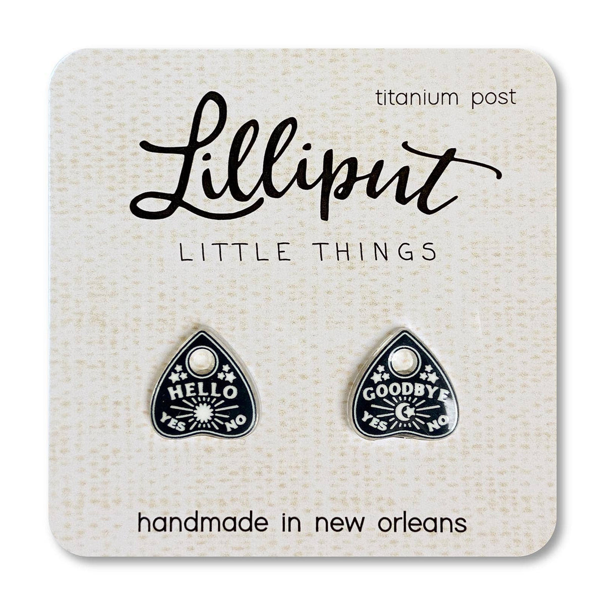 Pair of black and white earrings on a Lilliput Little Things card.