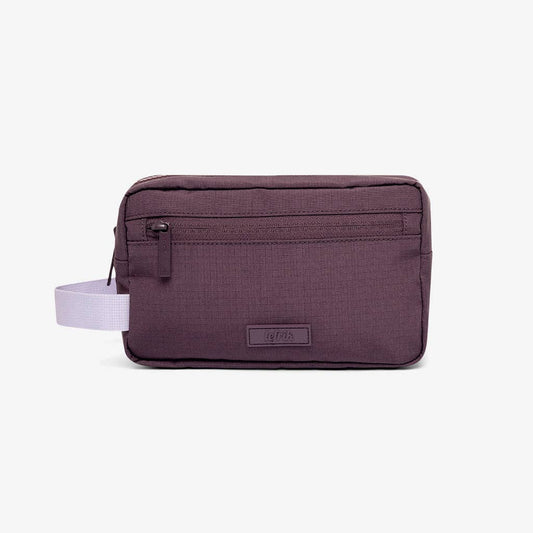 Purple travel pouch with a white strap on a light gray background