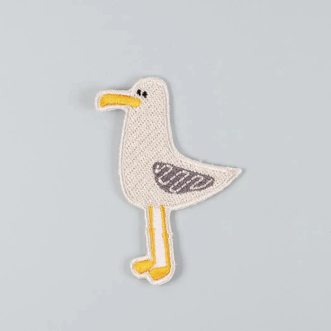Seagull-shaped patch on a gray background