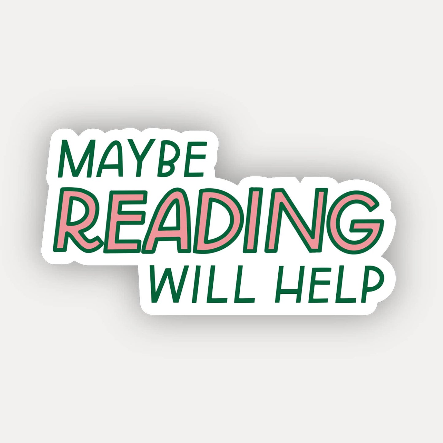 Sticker with text 'MAYBE READING WILL HELP' on a light gray background