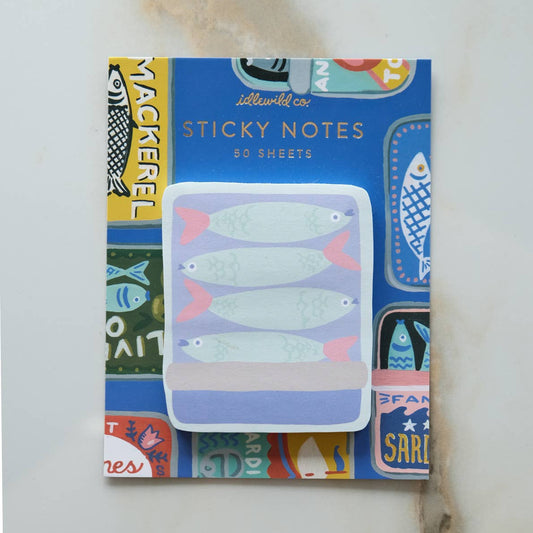 Sticky notes with fish design on a colorful packaging