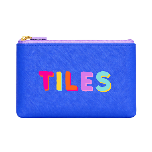 Blue pouch with colorful 'TILES' text on a white background