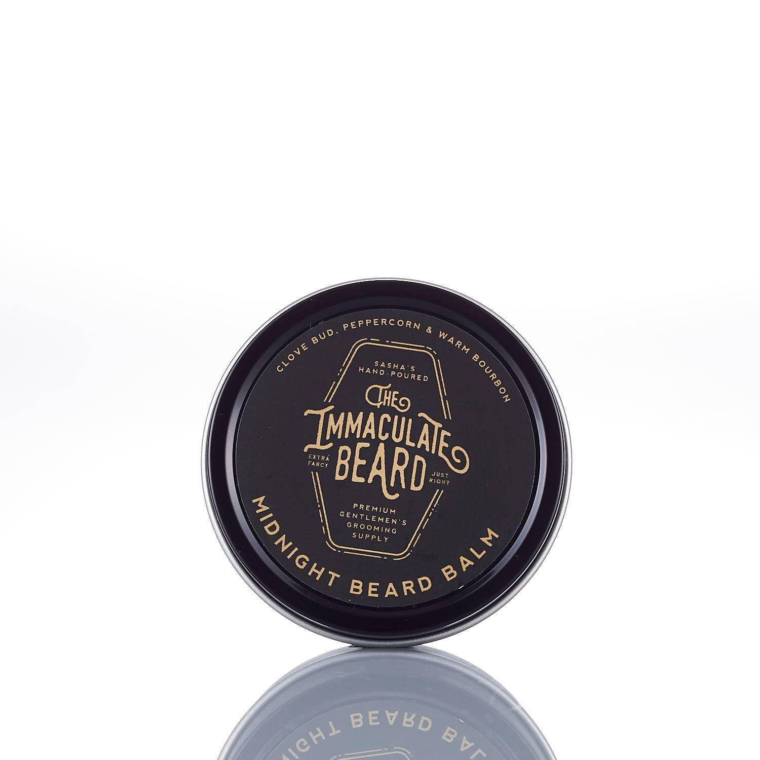 Black container of 'The Immaculate Beard' midnight beard balm on a white background