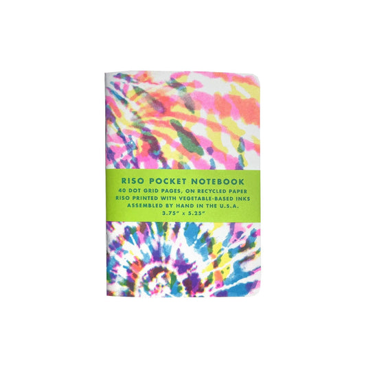 Tie-dye notebook with a green label on a white background