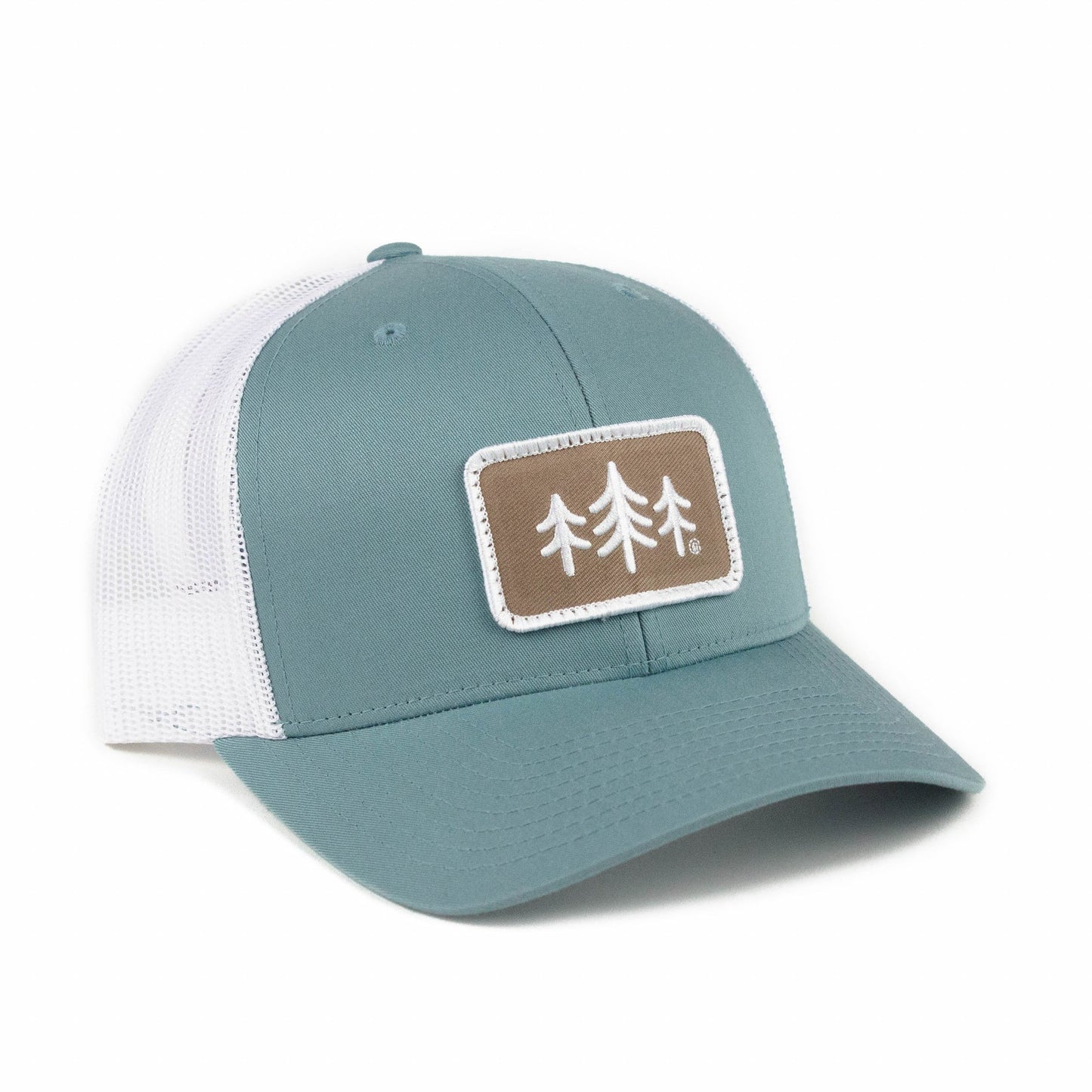 Teal and white cap with a brown patch featuring tree icons on a white background
