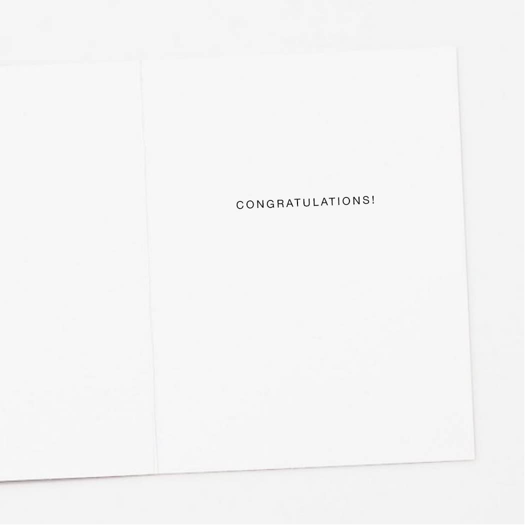 White card with 'CONGRATULATIONS!' text on a white background