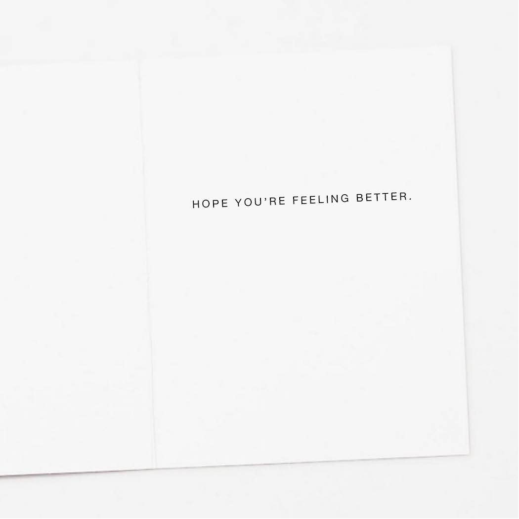 White card with black text 'HOPE YOU'RE FEELING BETTER.'