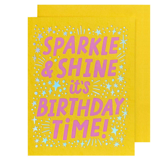 Yellow card with pink text 'Sparkle & Shine it's Birthday Time!' on a white background