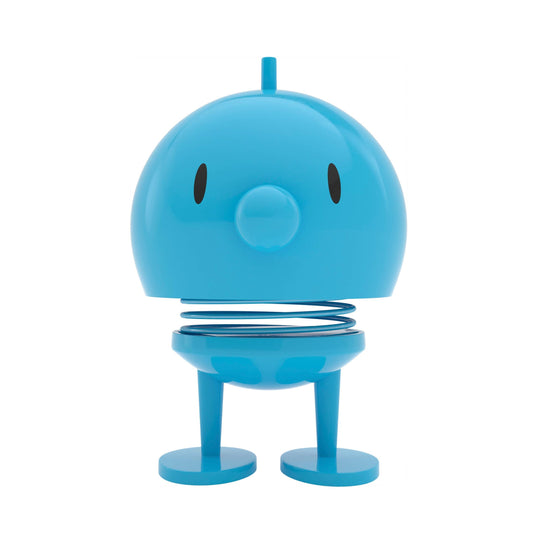 Blue robot toy on a white background