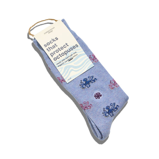 Blue sock with floral patterns on a white background