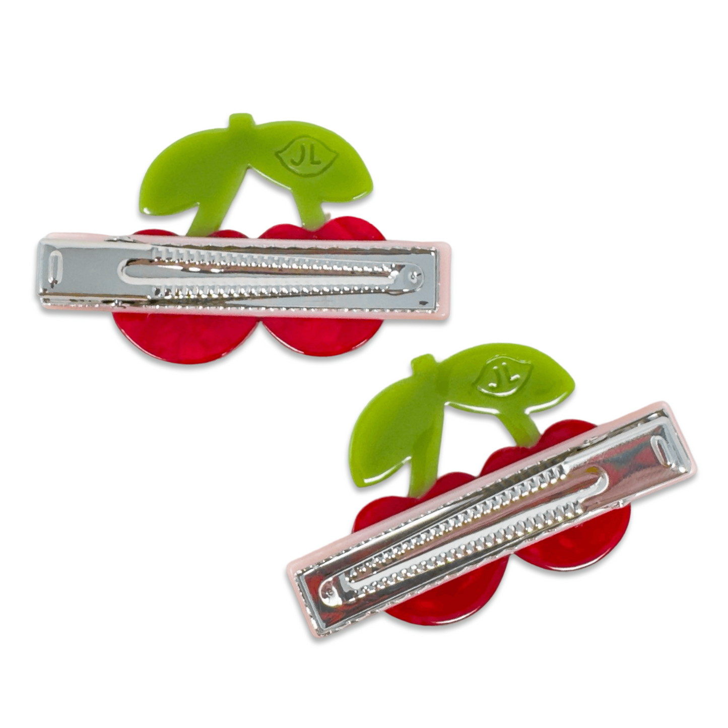 Two cherry-themed hair clips with green leaves on a white background