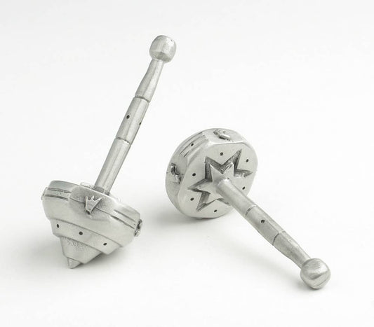 Metallic salt and pepper shakers on a white background