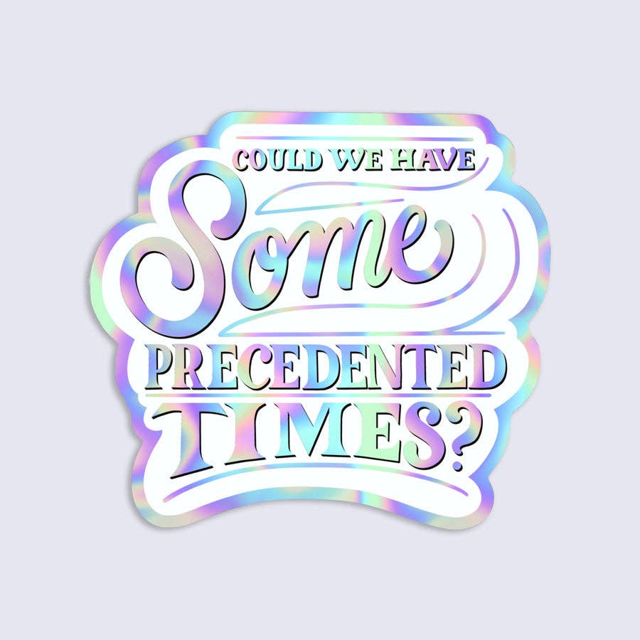 Holographic sticker with text 'Could we have some unprecedented times?' on a light purple background