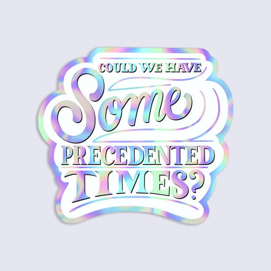 Holographic sticker with text 'Could we have some unprecedented times?' on a light purple background