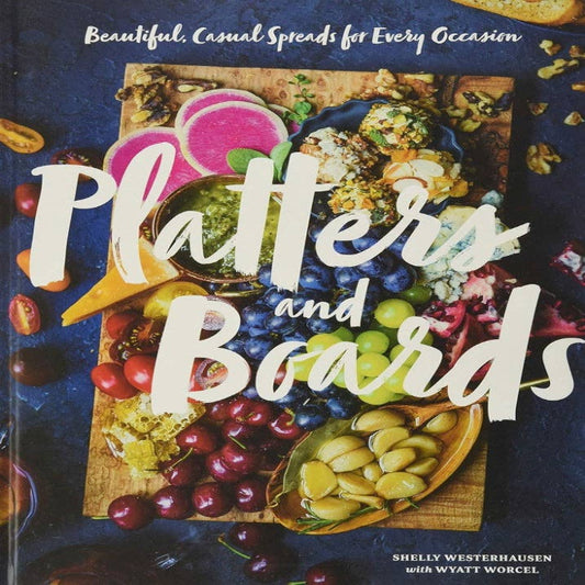 Book cover of 'Platters and Boards' with food images and text on a dark background