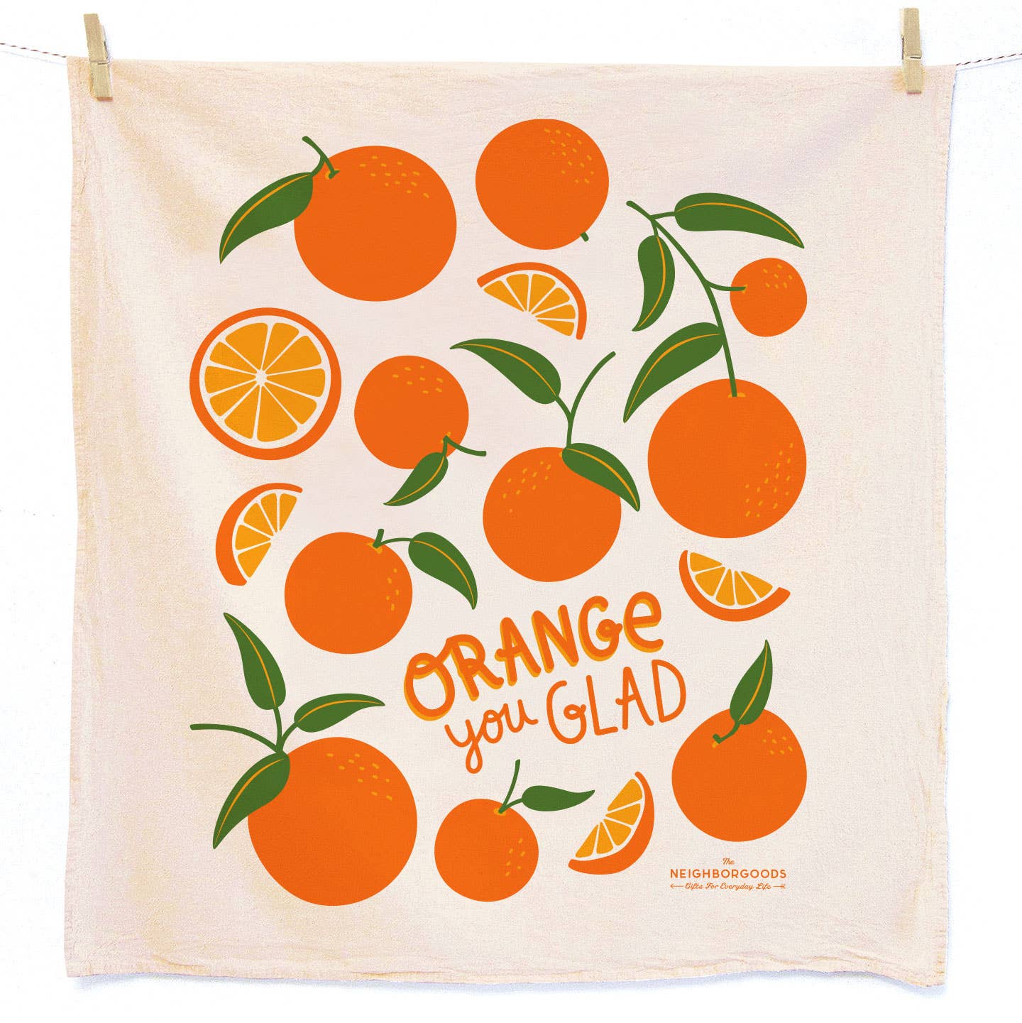 Towel with orange design and 'Orange you Glad' text on a white background