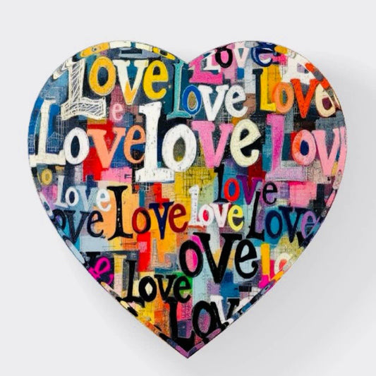 Heart-shaped decorative item with 'love' text in various colors on a white background