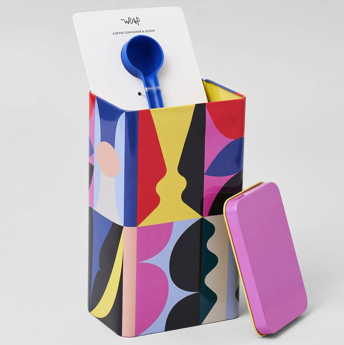 Colorful geometric-patterned box with a blue scoop on a white background