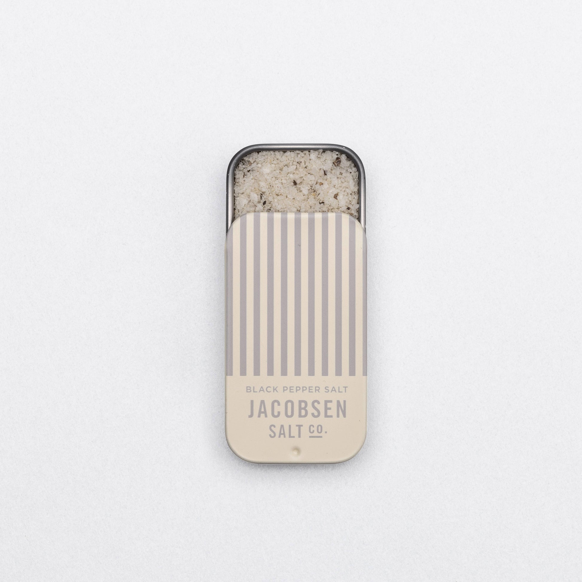  Jacobsen Salt Co. black pepper salt container on a white background