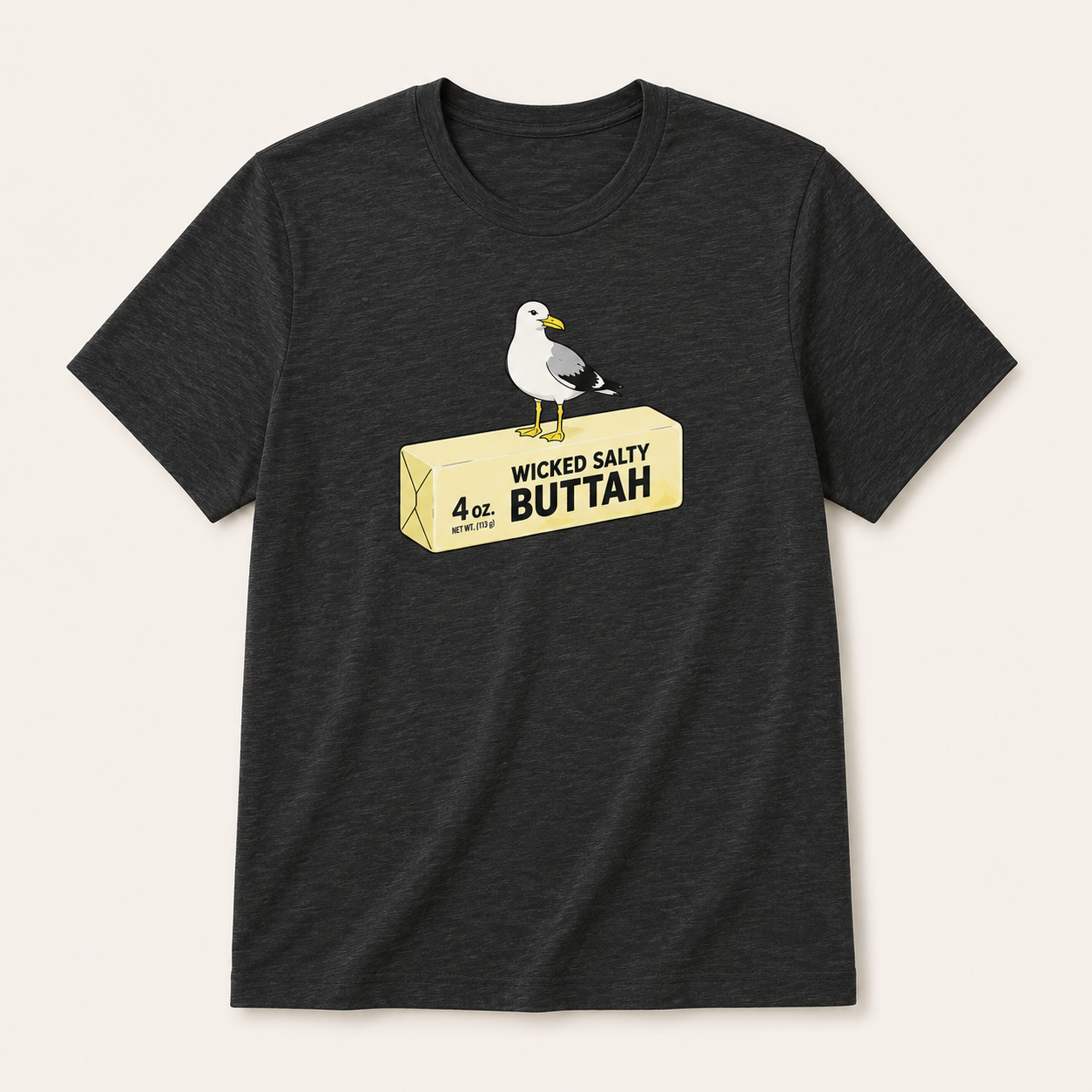 Black t-shirt with a seagull graphic and text on a beige background
