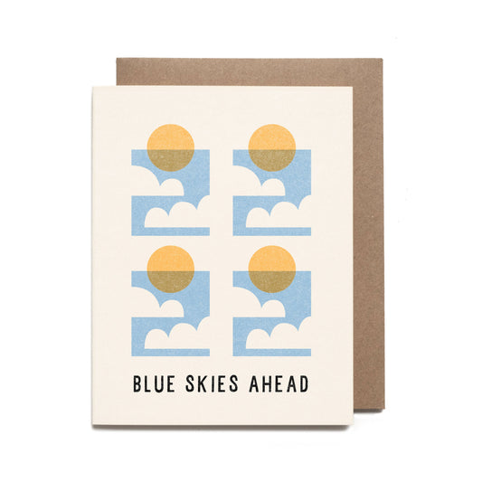 Card with sun and cloud design and 'Blue Skies Ahead' text on a white background